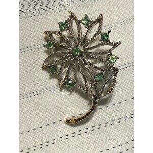 Filigree design brooch flower pin green stones